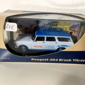Peugeot 404 break vitrée bleue et bleue avec publicité VITTEL