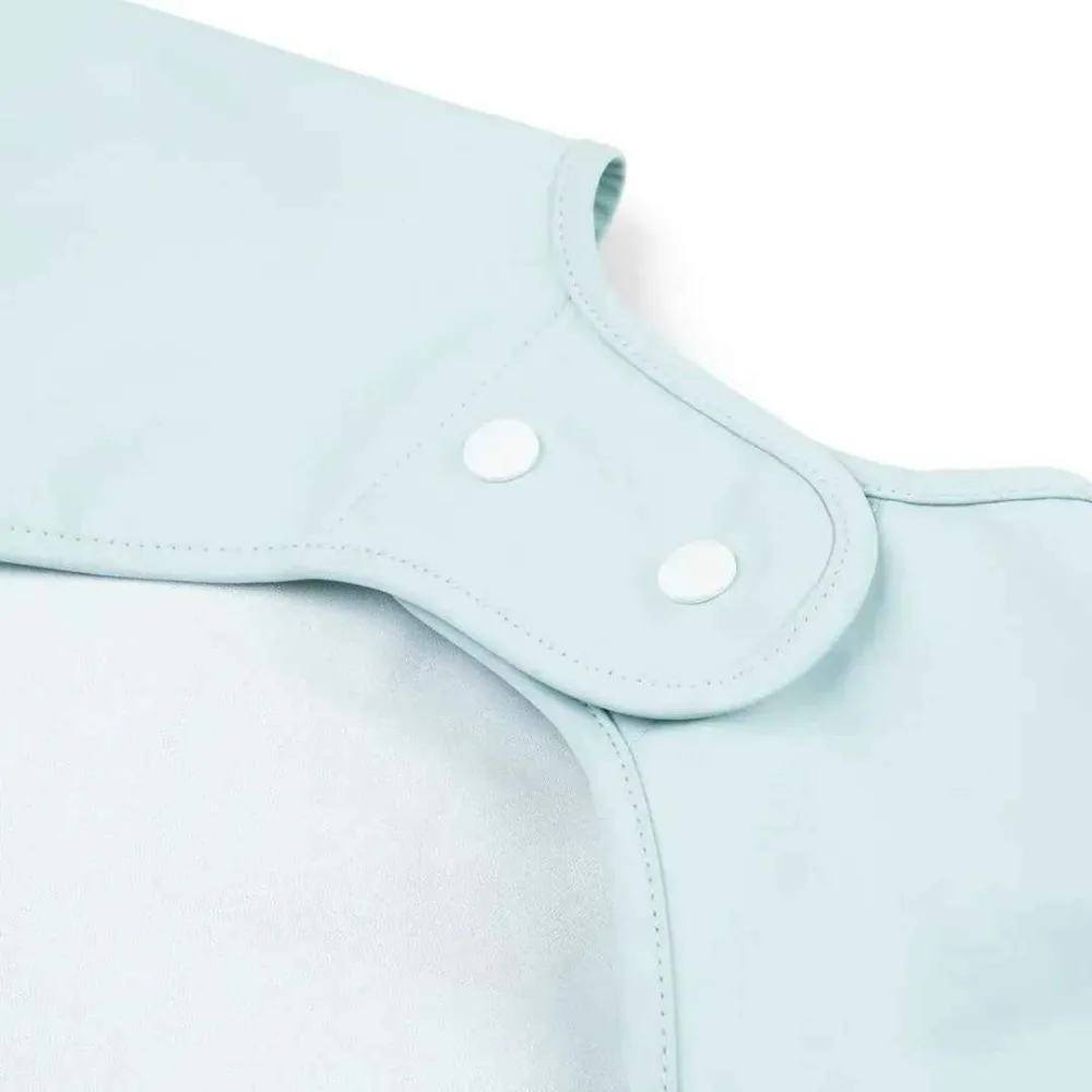 Étui de selle Done Deer® Bavoir avec manches Playground Blue