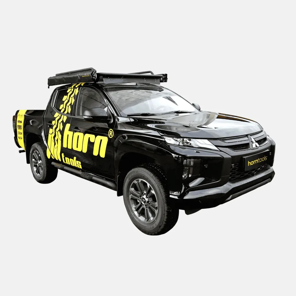 Barres de toit NAVIS pour Mitsubishi L200