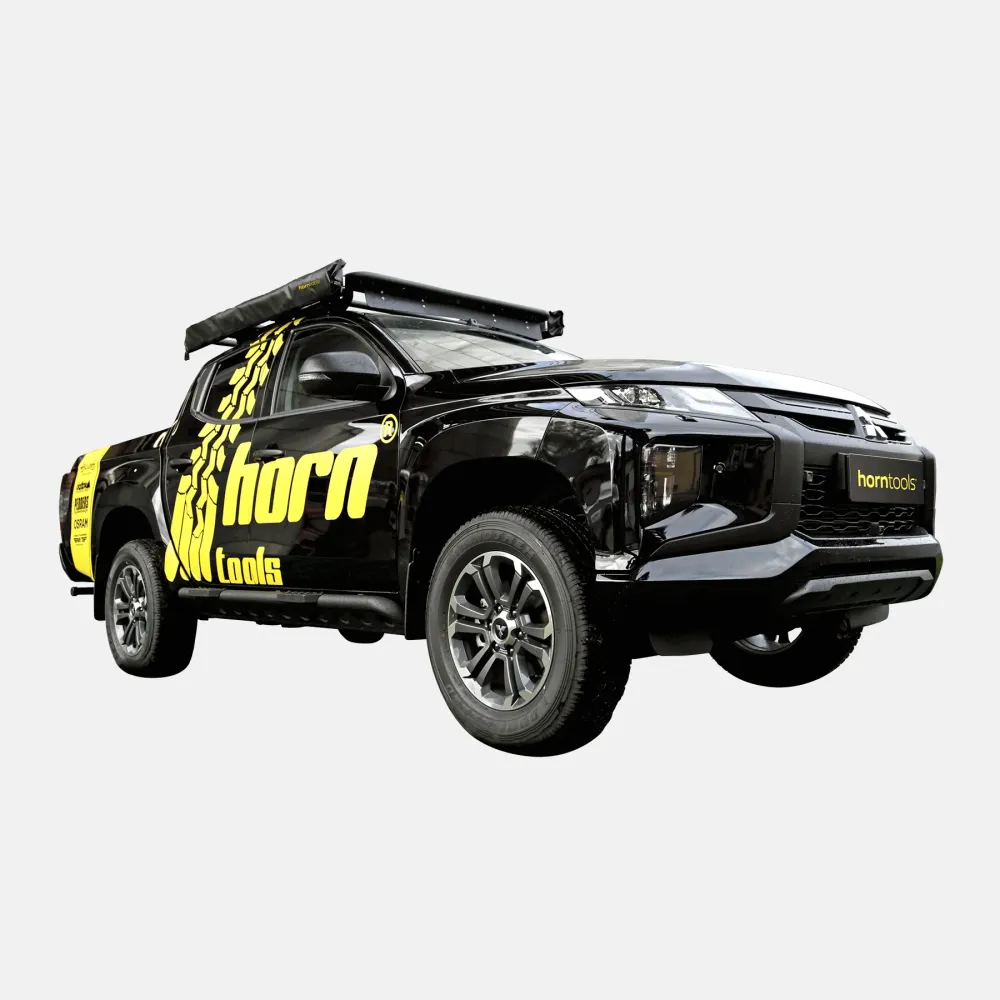 Barres de toit NAVIS pour Mitsubishi L200