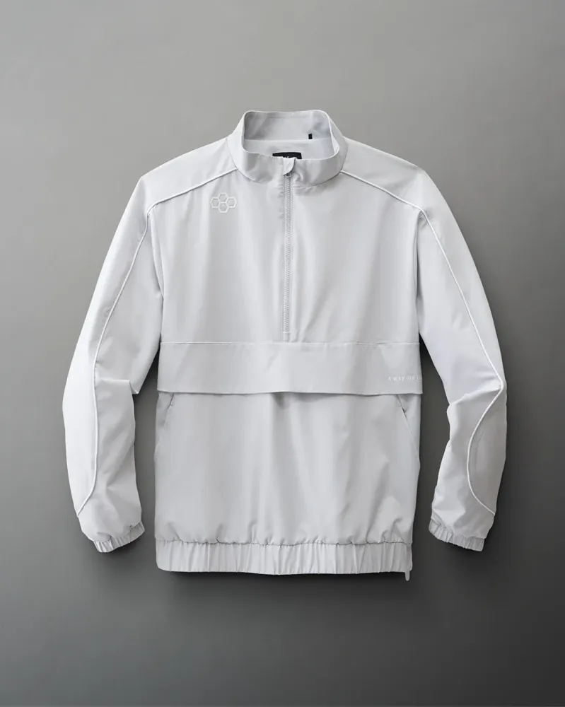 Coupe-vent 1/4 zip RUDIS - Gris lunaire avec système antivol
