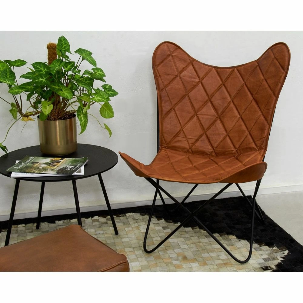 Fauteuil butterfly en cuir Action Nettoyante Profonde
