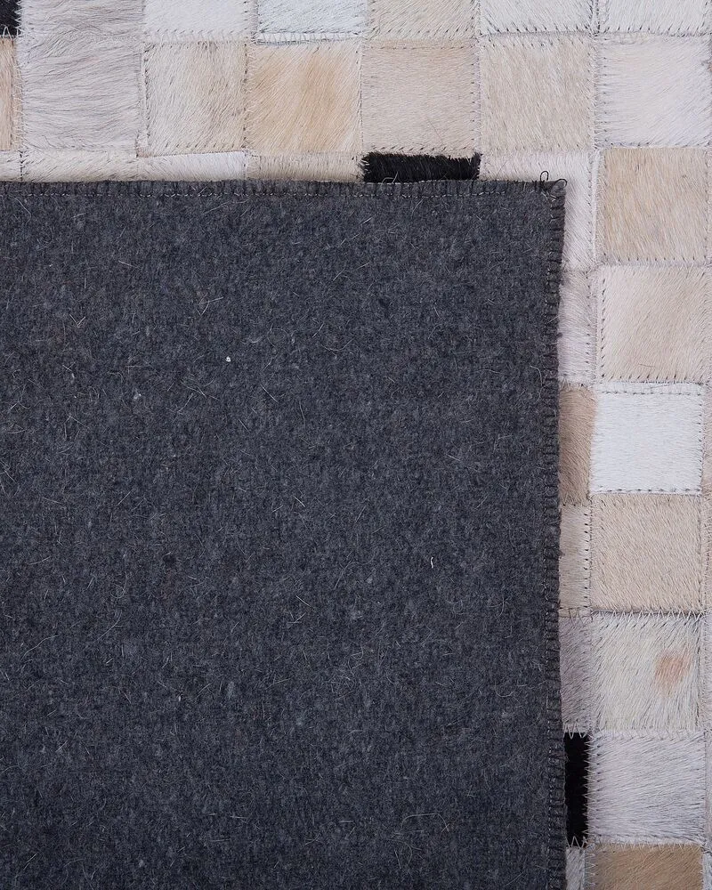 Cowhide Area Rug 140 x 200 cm Black and Écru ERFELEK