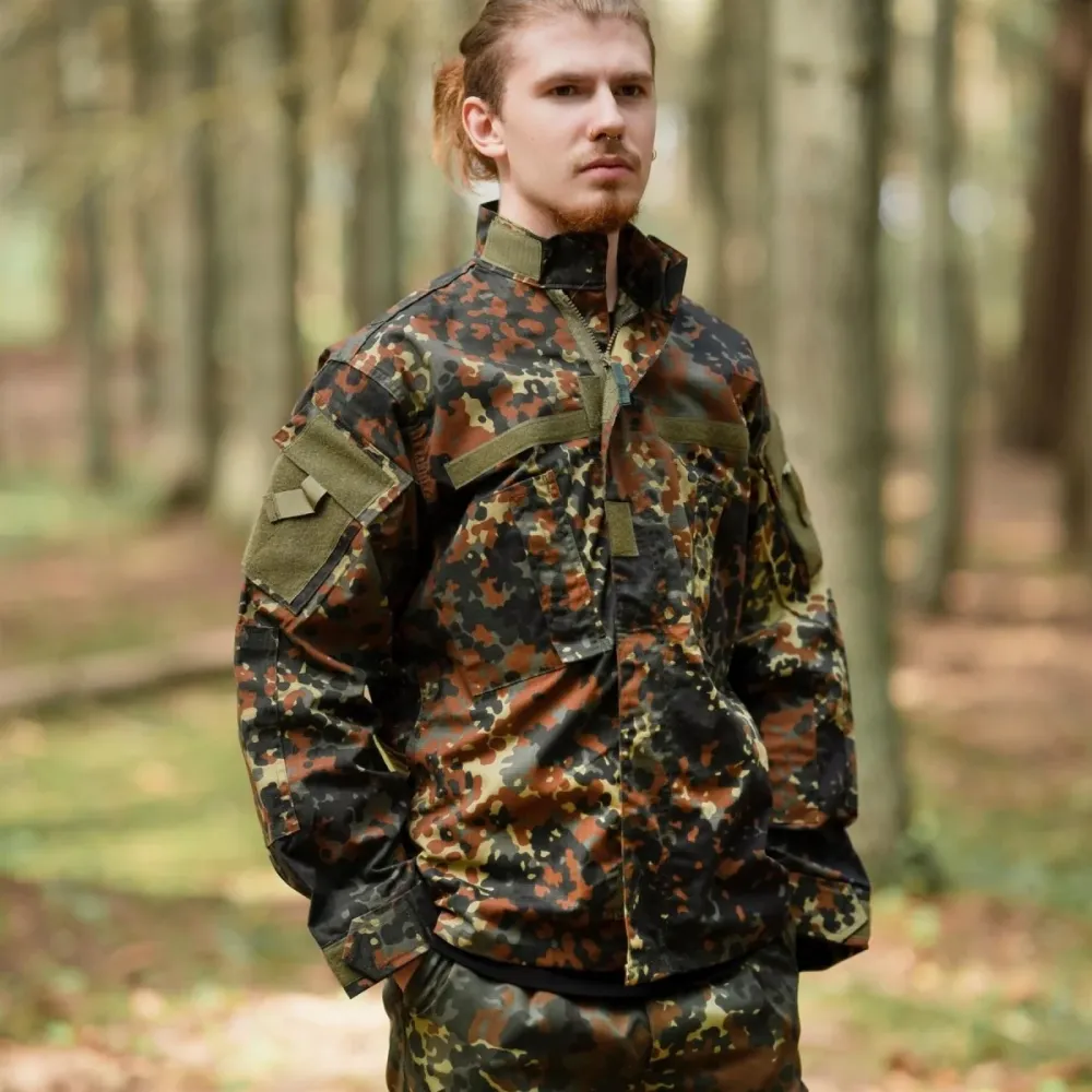 Filet de sécurité Veste de style militaire américain de marque MFH, uniforme de terrain, camouflage flecktarn, ripstop, NEUF